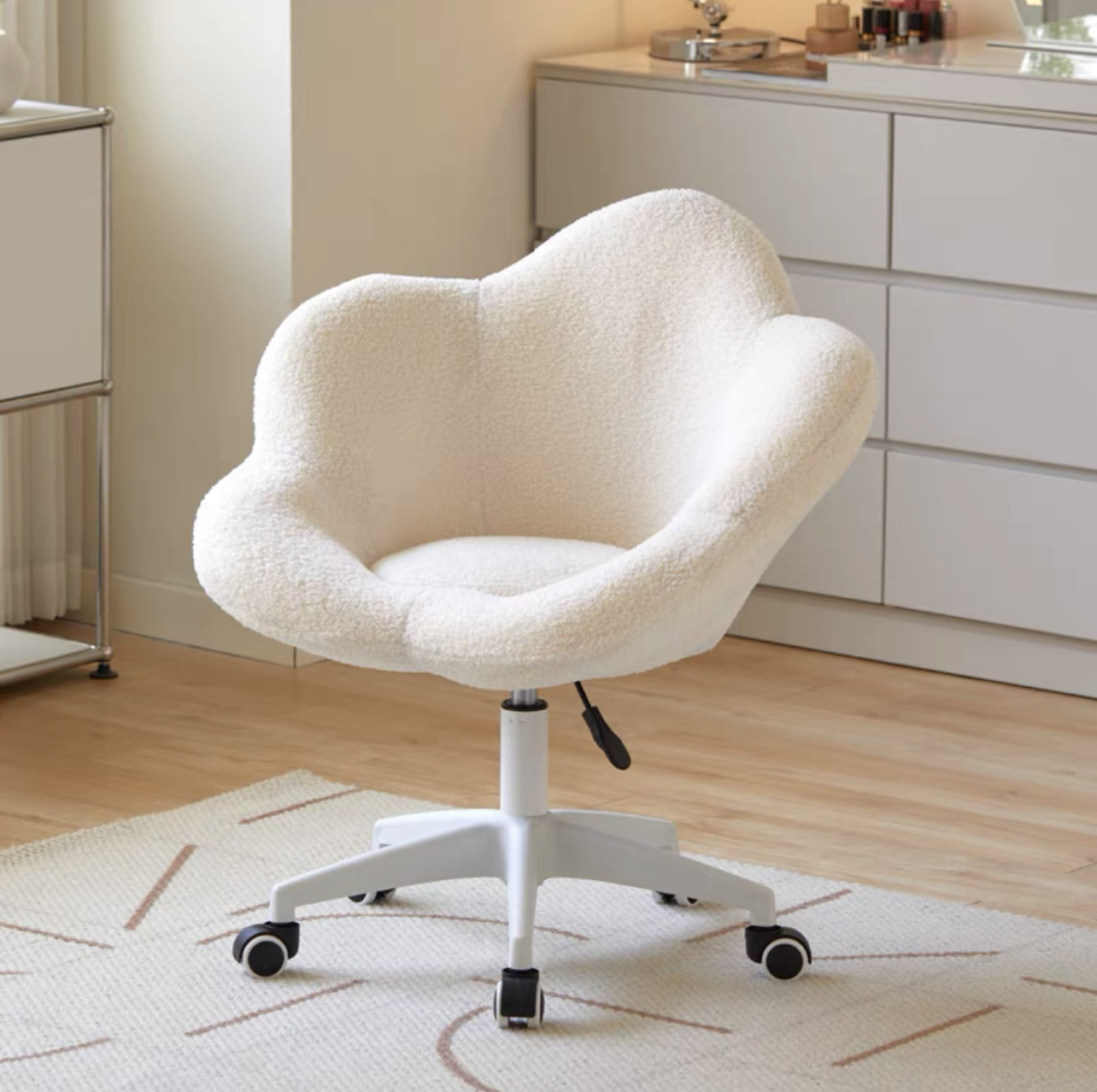 Cozy Cloud Swivel Chair in soft cream upholstery